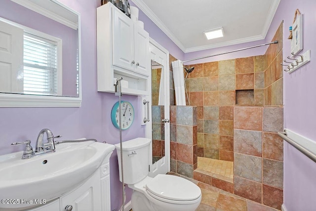 bathroom with vanity, crown molding, and a shower with curtain