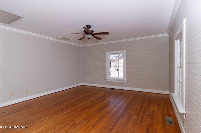 unfurnished room with wood-type flooring, ceiling fan, and ornamental molding