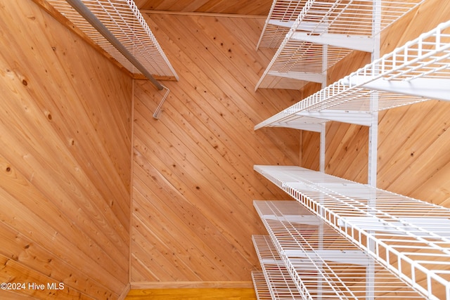 spacious closet featuring hardwood / wood-style floors