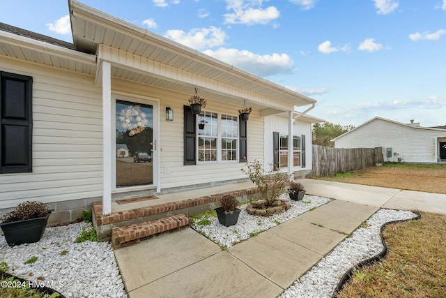 entrance to property with a porch