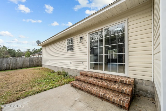 view of property exterior featuring a lawn