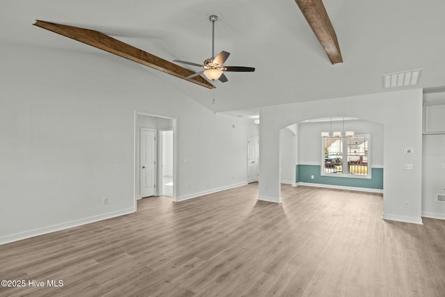 unfurnished living room with beamed ceiling, ceiling fan, high vaulted ceiling, and light wood-type flooring