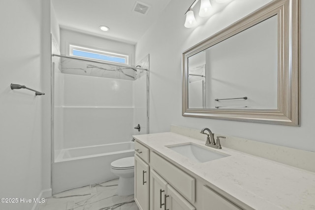 full bathroom featuring bathing tub / shower combination, vanity, and toilet