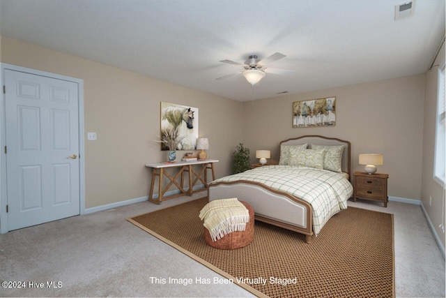 bedroom featuring ceiling fan and carpet floors