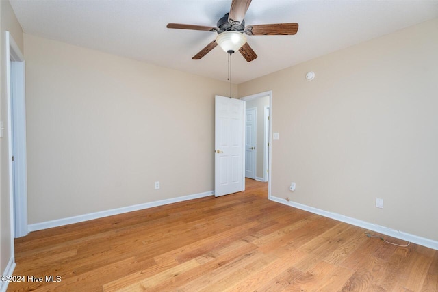 unfurnished bedroom featuring ceiling fan and light wood-type flooring