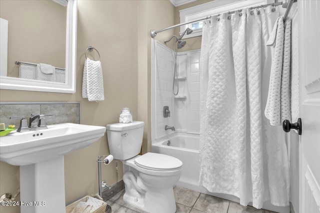 full bathroom with sink, toilet, tile patterned floors, shower / bath combo, and backsplash