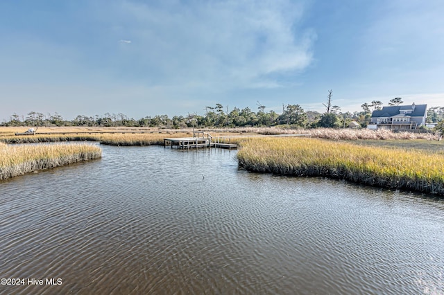 property view of water featuring a dock