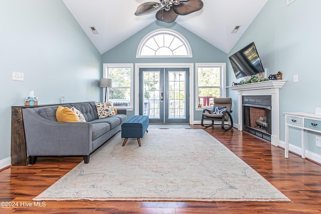 living room featuring ceiling fan, french doors, high vaulted ceiling, and dark hardwood / wood-style floors