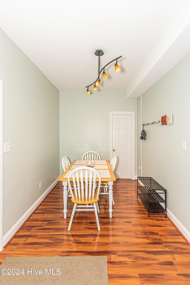 dining room featuring wood-type flooring