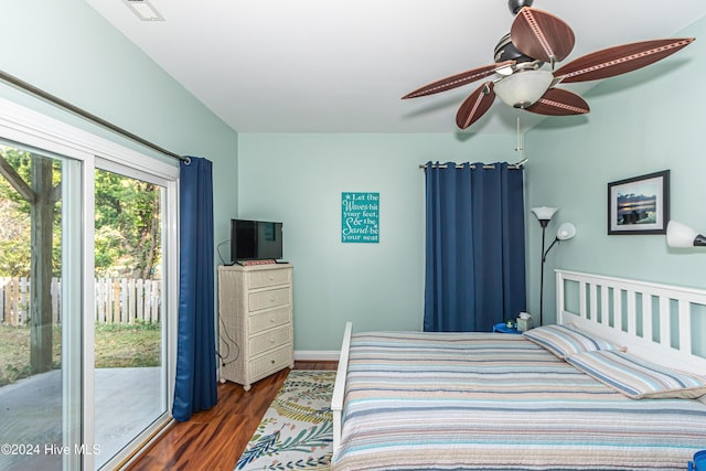 bedroom featuring access to outside, ceiling fan, and dark hardwood / wood-style floors