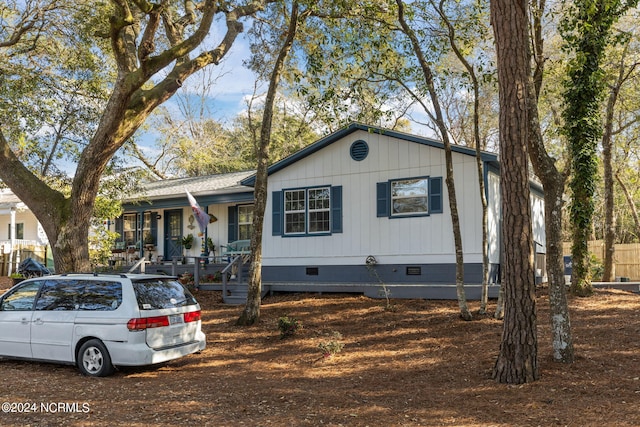 151 Hoop Pole Creek Dr Unit E & W, Atlantic Beach, NC 28512 - view of front of house featuring crawl space and a porch