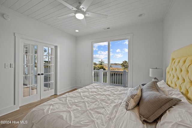 bedroom with access to outside, ceiling fan, hardwood / wood-style floors, and french doors