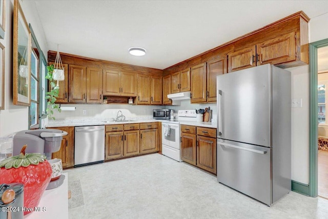 kitchen with sink and stainless steel appliances