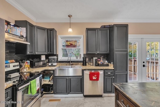 kitchen with exhaust hood, french doors, sink, decorative backsplash, and appliances with stainless steel finishes