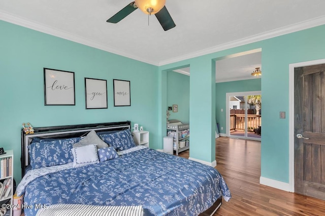 bedroom with ceiling fan, wood-type flooring, and ornamental molding