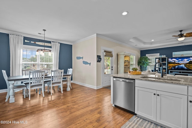 kitchen featuring white cabinetry, dishwasher, pendant lighting, and plenty of natural light