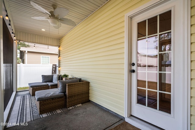 exterior space with ceiling fan