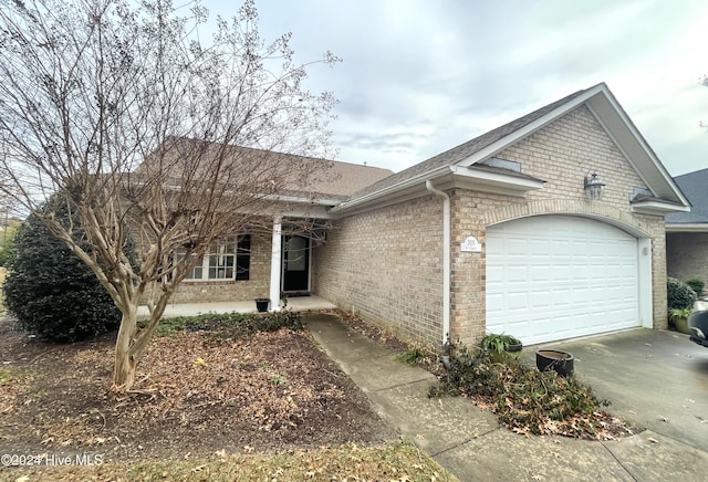 single story home with a garage