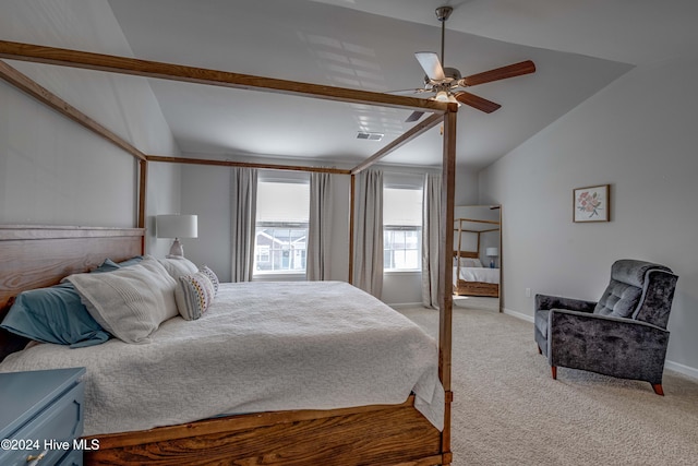 carpeted bedroom featuring ceiling fan and vaulted ceiling with beams