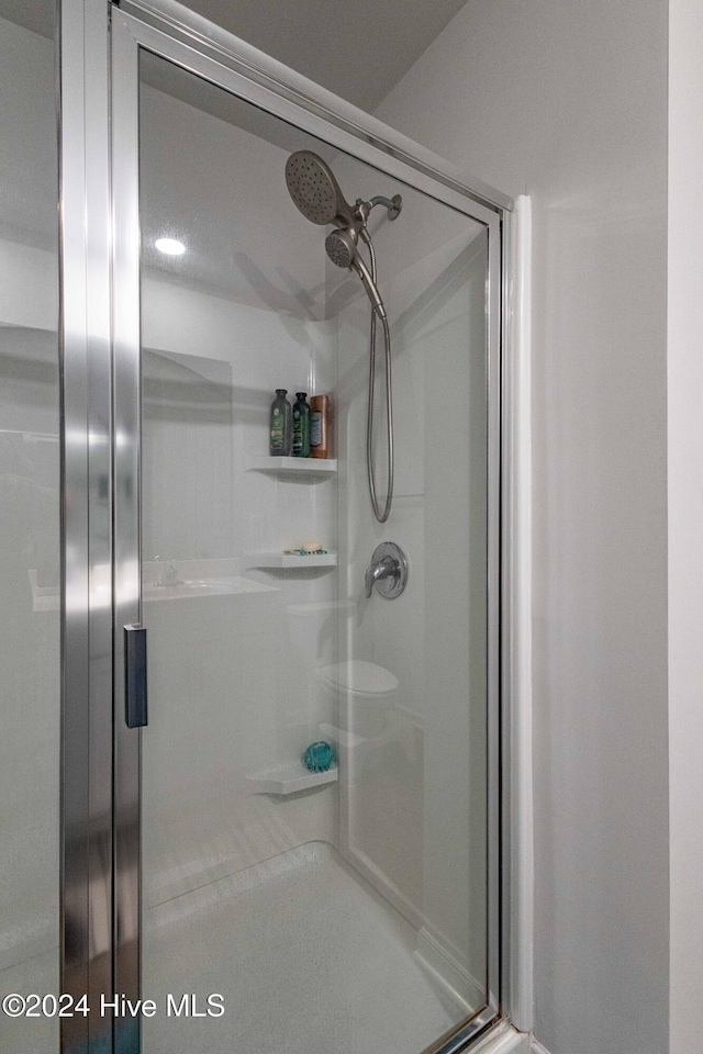 bathroom with walk in shower