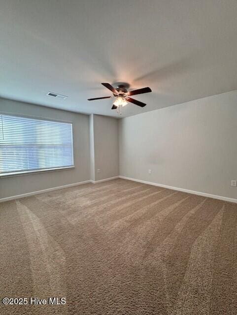 unfurnished room with carpet floors and ceiling fan