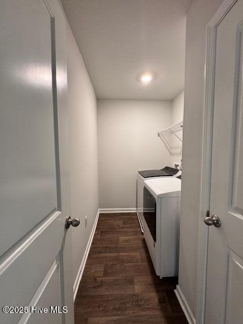 laundry room featuring dark hardwood / wood-style floors and independent washer and dryer