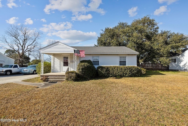 view of front facade with a front lawn and a porch