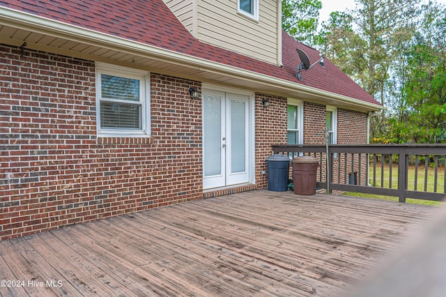 wooden deck featuring french doors