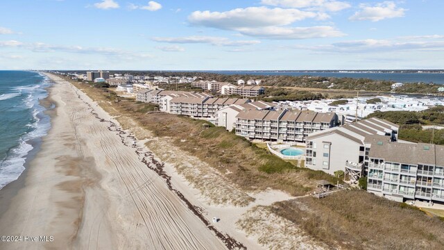 view of community with a view of the beach, a gazebo, and a water view