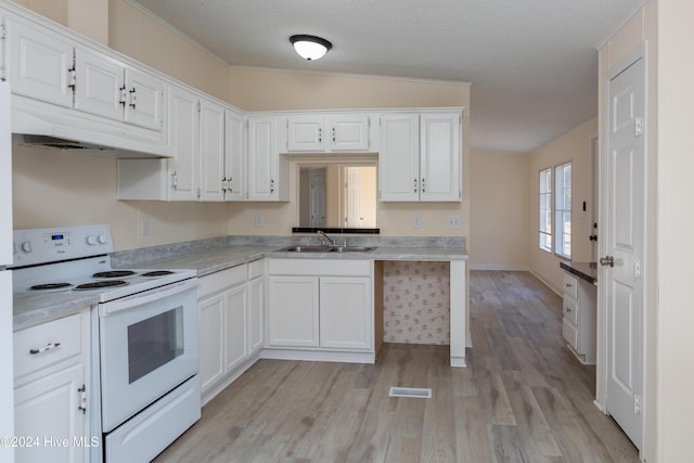 kitchen with white cabinetry, sink, light hardwood / wood-style flooring, white range with electric cooktop, and vaulted ceiling