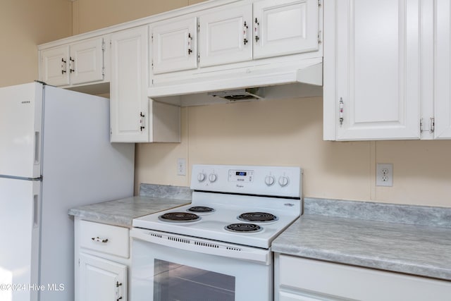 kitchen with white appliances and white cabinetry