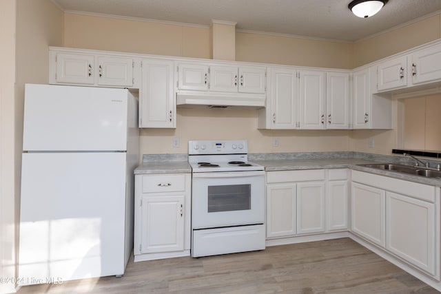 kitchen featuring sink, white cabinets, white appliances, and ornamental molding