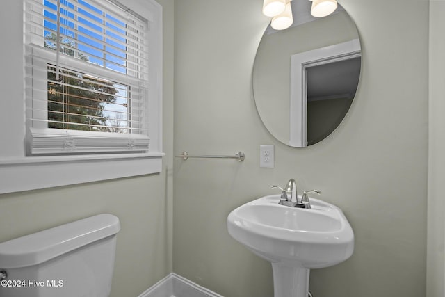 bathroom with sink and toilet