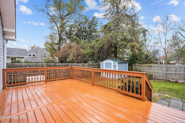 deck featuring a shed