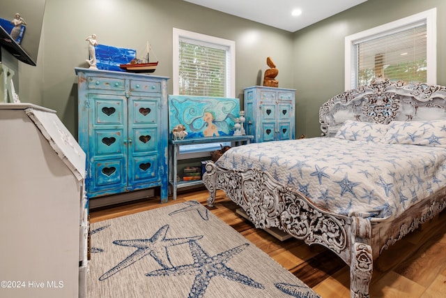 bedroom featuring hardwood / wood-style flooring