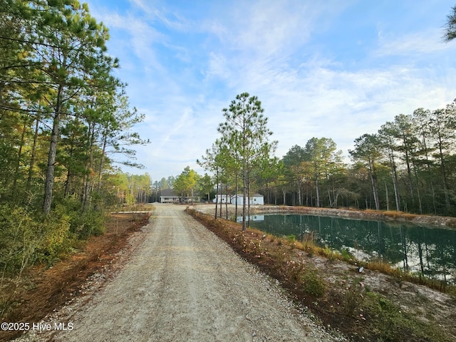 view of road featuring a water view