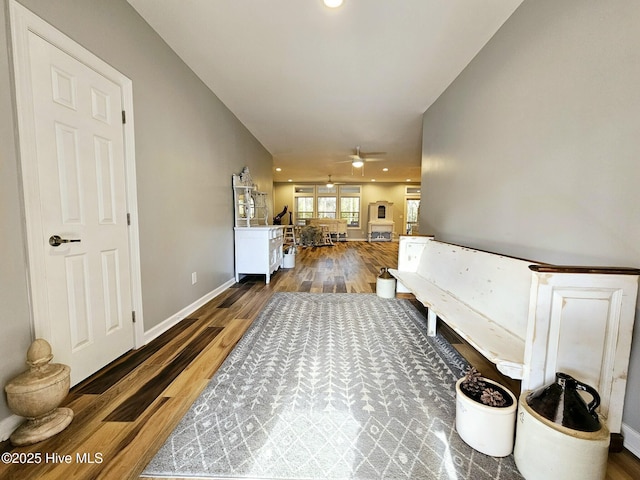 corridor featuring wood-type flooring