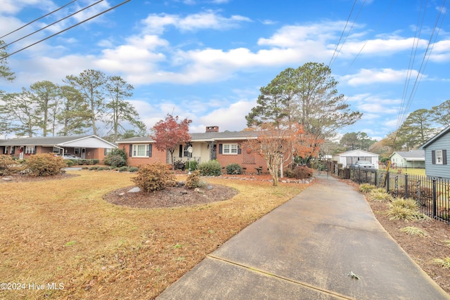 view of front of home with a front lawn