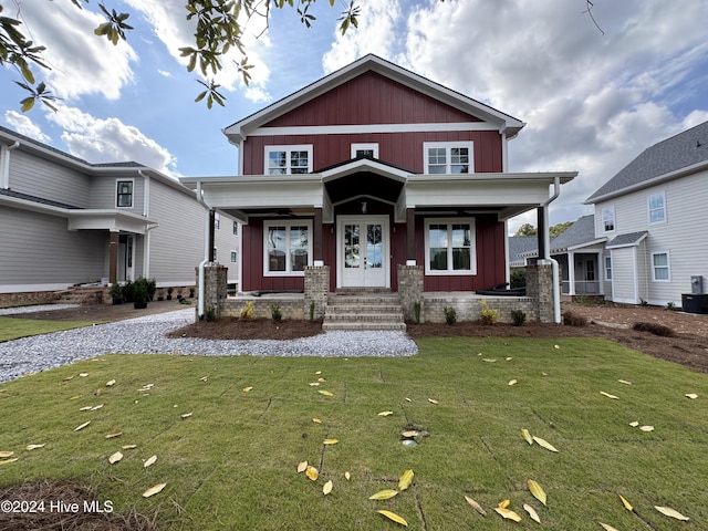 craftsman-style home featuring a front lawn and a porch