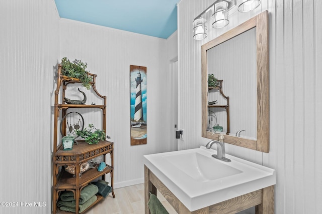 bathroom with hardwood / wood-style flooring