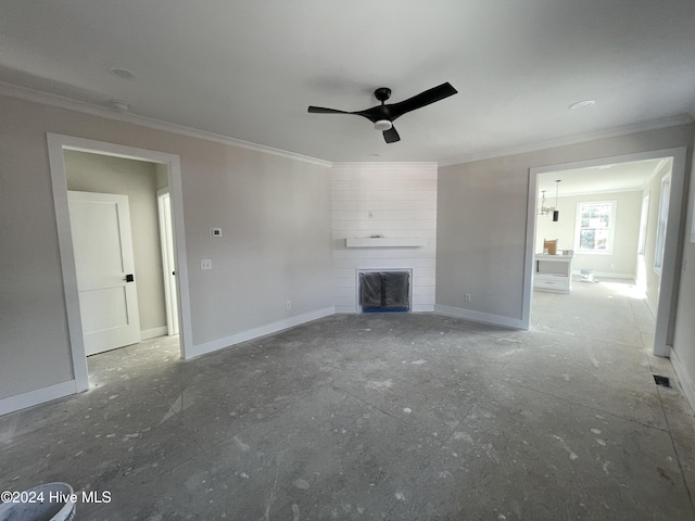 unfurnished living room with a fireplace, ceiling fan, and ornamental molding