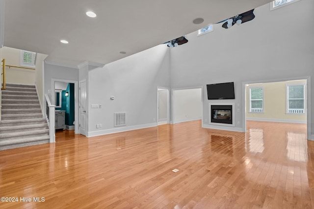 unfurnished living room featuring light hardwood / wood-style flooring