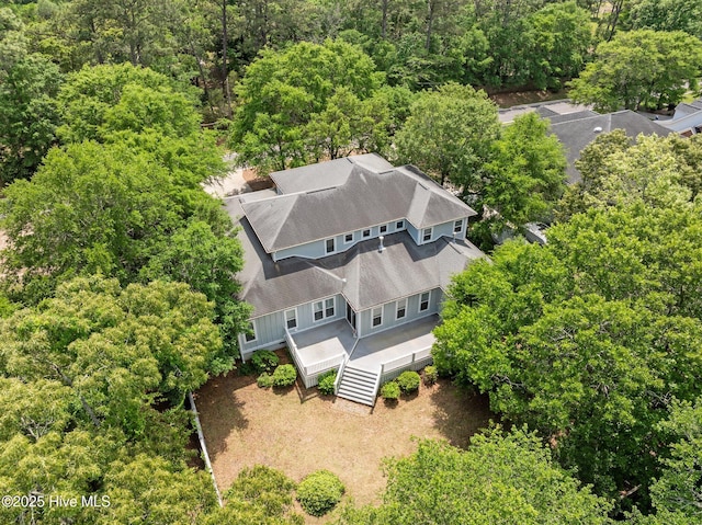 bird's eye view featuring a view of trees