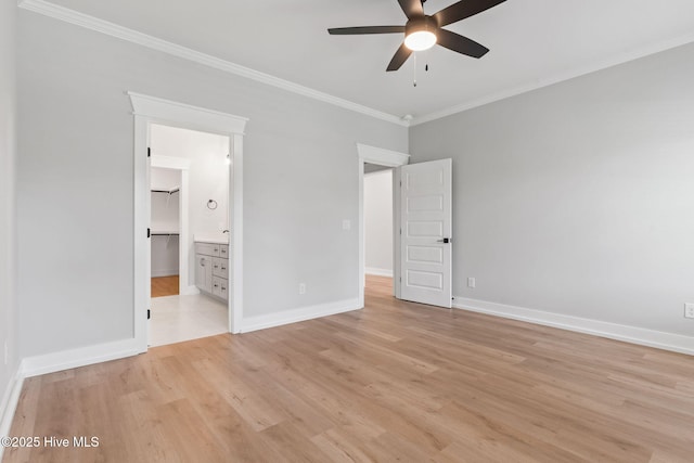 457 Raven Glen Dr, Southport, NC 28461 - unfurnished bedroom featuring ornamental molding, light wood-style floors, and baseboards