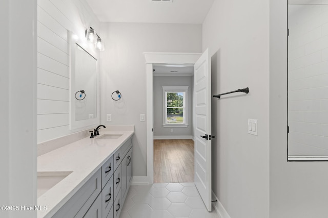 457 Raven Glen Dr, Southport, NC 28461 - full bathroom featuring double vanity, baseboards, and tile patterned flooring
