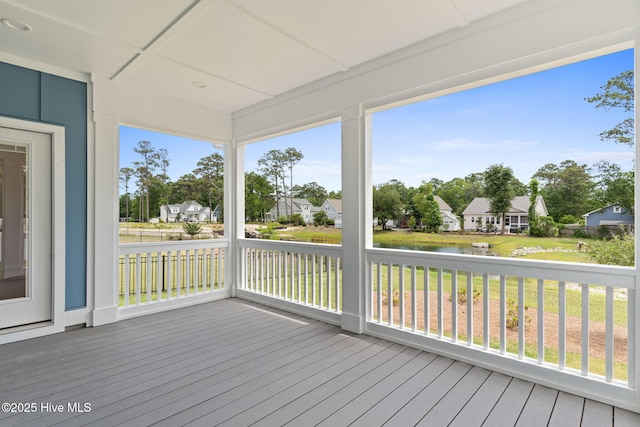 457 Raven Glen Dr, Southport, NC 28461 - wooden deck featuring a residential view, a water view, and a yard