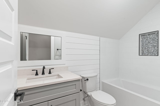 457 Raven Glen Dr, Southport, NC 28461 - full bath featuring toilet, vanity, vaulted ceiling, and bathtub / shower combination