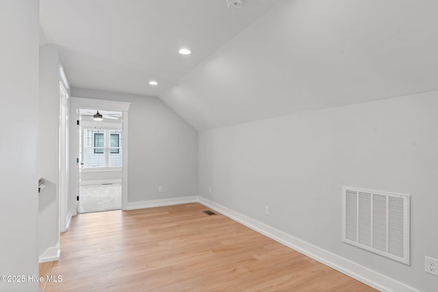 457 Raven Glen Dr, Southport, NC 28461 - additional living space featuring vaulted ceiling, baseboards, light wood-style floors, and recessed lighting