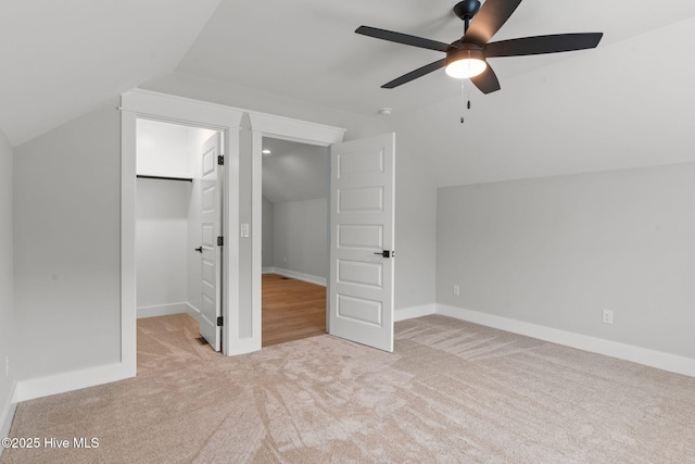 457 Raven Glen Dr, Southport, NC 28461 - additional living space featuring vaulted ceiling, ceiling fan, carpet flooring, and baseboards