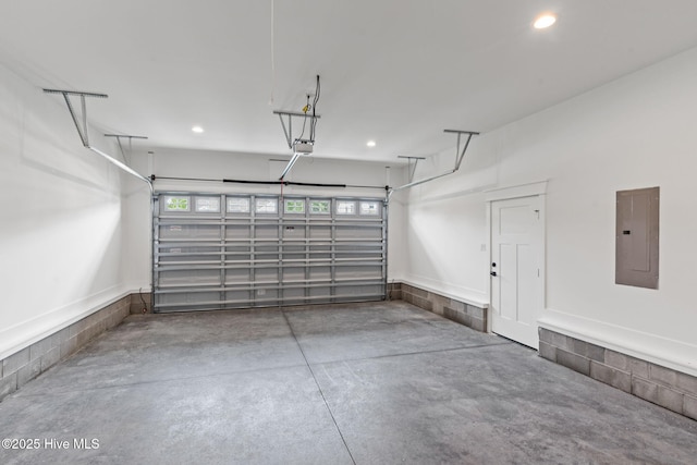 457 Raven Glen Dr, Southport, NC 28461 - garage with electric panel, recessed lighting, and a garage door opener
